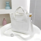 Wasserabweisende Canvas-Handtasche mit geflochtenem Riemen