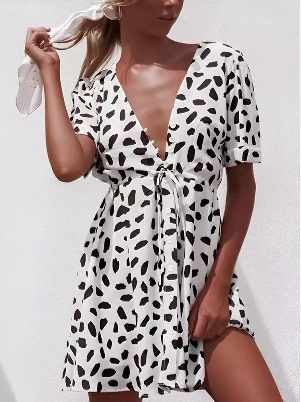 Weißes Minikleid mit Polka-Dot-Muster, V-Ausschnitt und Wickel-Design