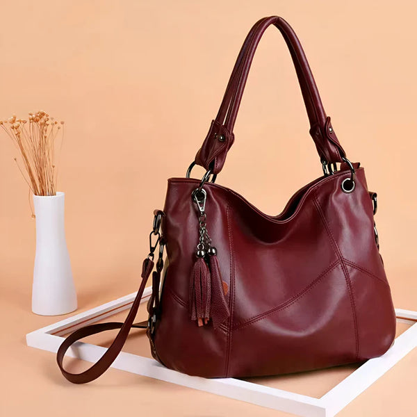 Damen-Crossbody-Designertasche aus Leder mit Quaste