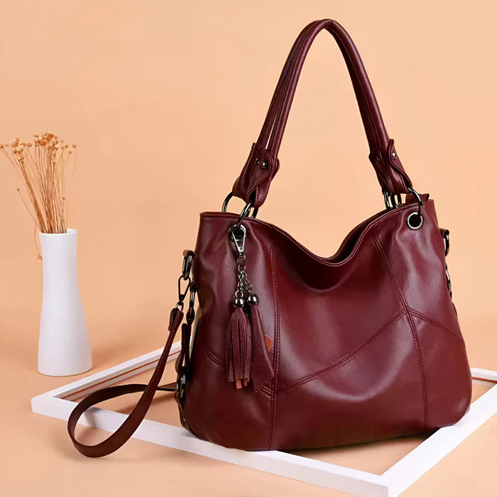 Damen-Crossbody-Designertasche aus Leder mit Quaste