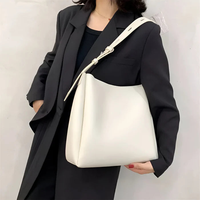 Schulterhandtasche mit großer Kapazität und passender Tasche