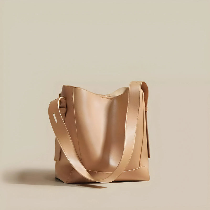 Moderne Schultertasche im Bucket-Stil mit Knopfverschluss