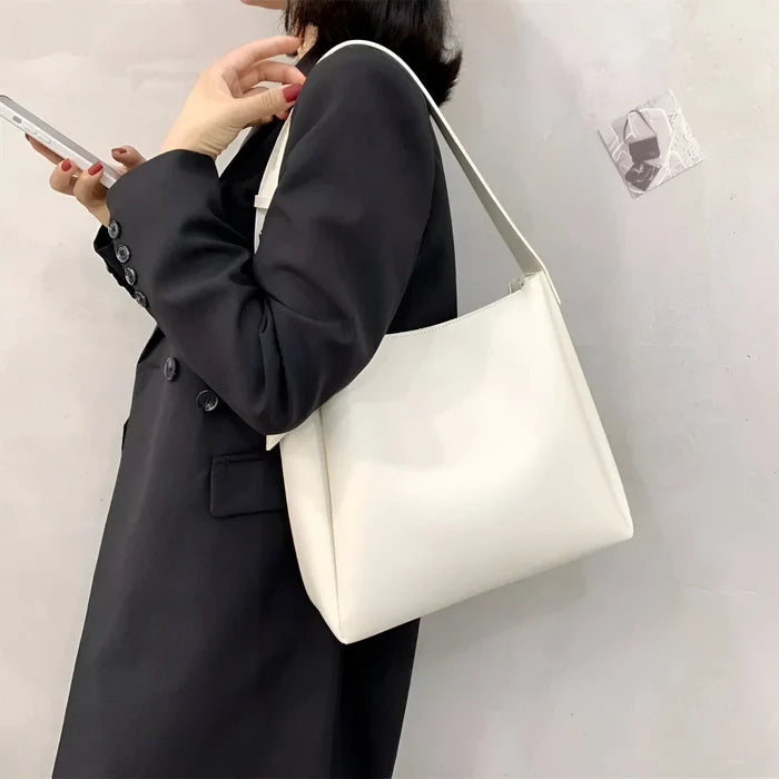 Schulterhandtasche mit großer Kapazität und passender Tasche