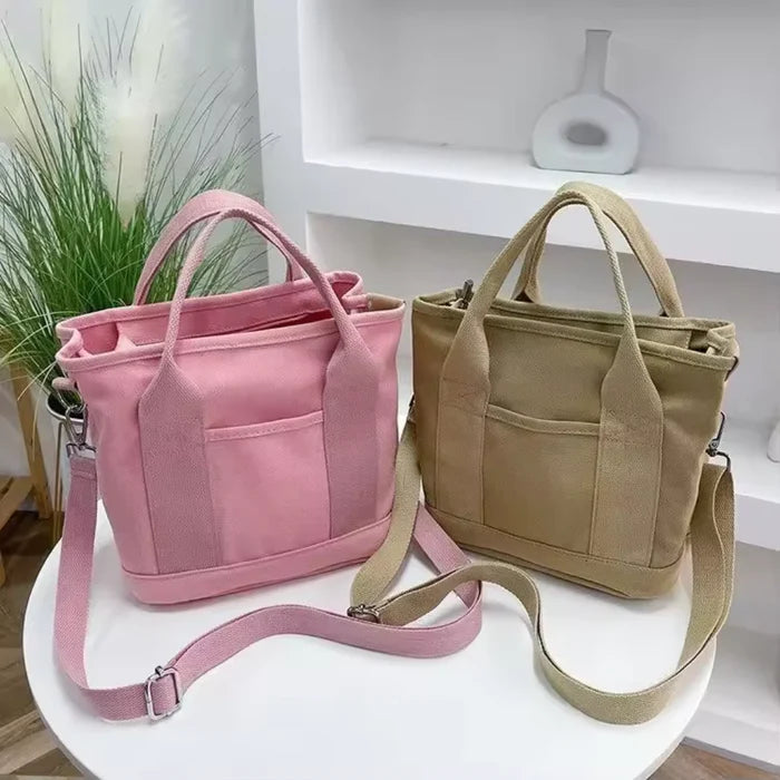 Wasserabweisende Canvas-Handtasche mit geflochtenem Riemen