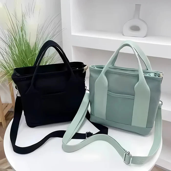 Wasserabweisende Canvas-Handtasche mit geflochtenem Riemen