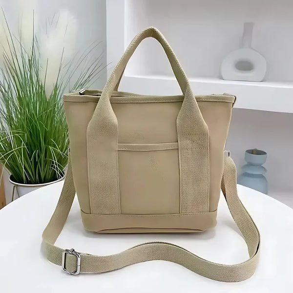 Wasserabweisende Canvas-Handtasche mit geflochtenem Riemen