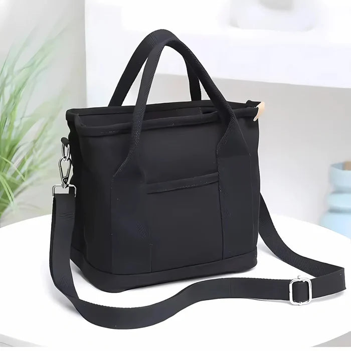 Wasserabweisende Canvas-Handtasche mit geflochtenem Riemen