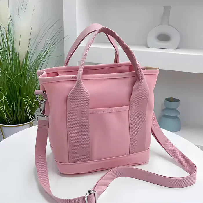 Wasserabweisende Canvas-Handtasche mit geflochtenem Riemen